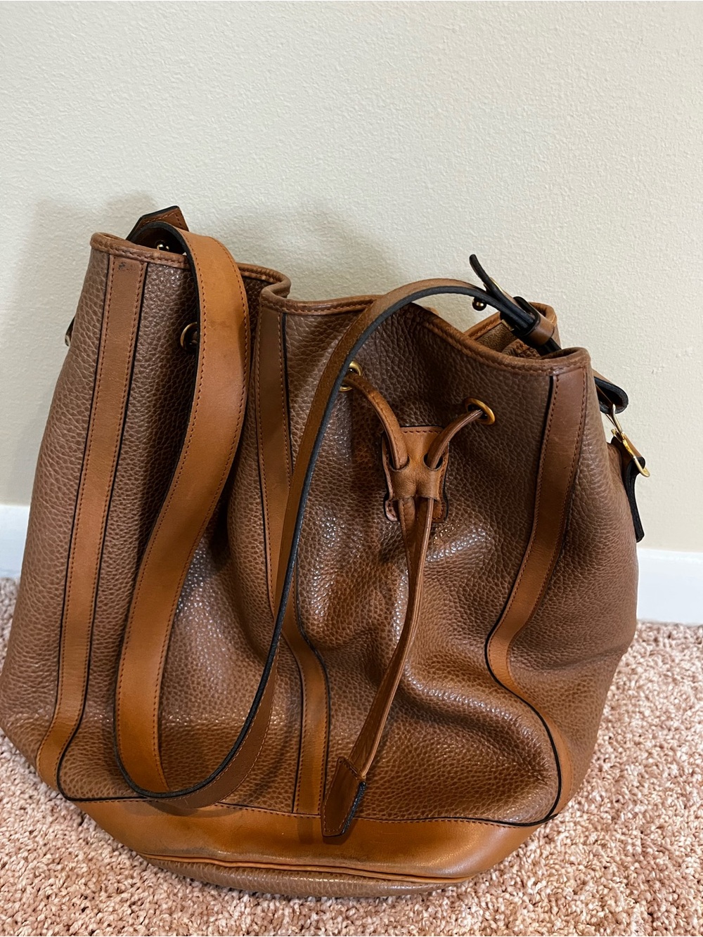 Authentic Christian Dior Pebbled Leather Bucket Bag with Drawstring in Cognac